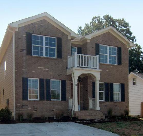 Two story house with balcony